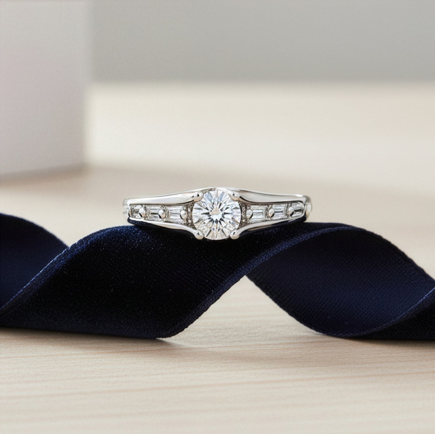 Round Brilliant & Baguette Diamond Ring in White Gold