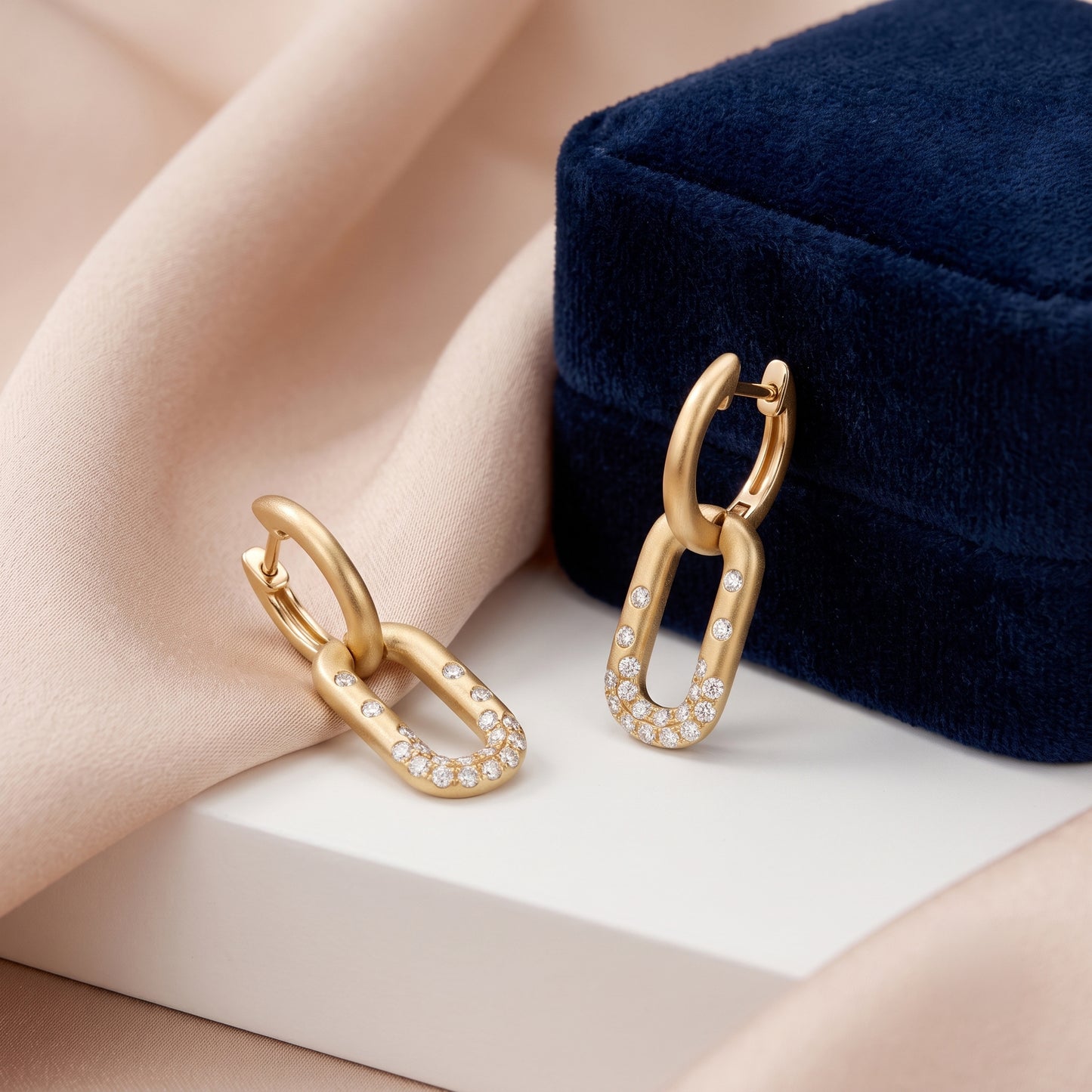 Lucent's Linked Diamond Huggies in Yellow Gold