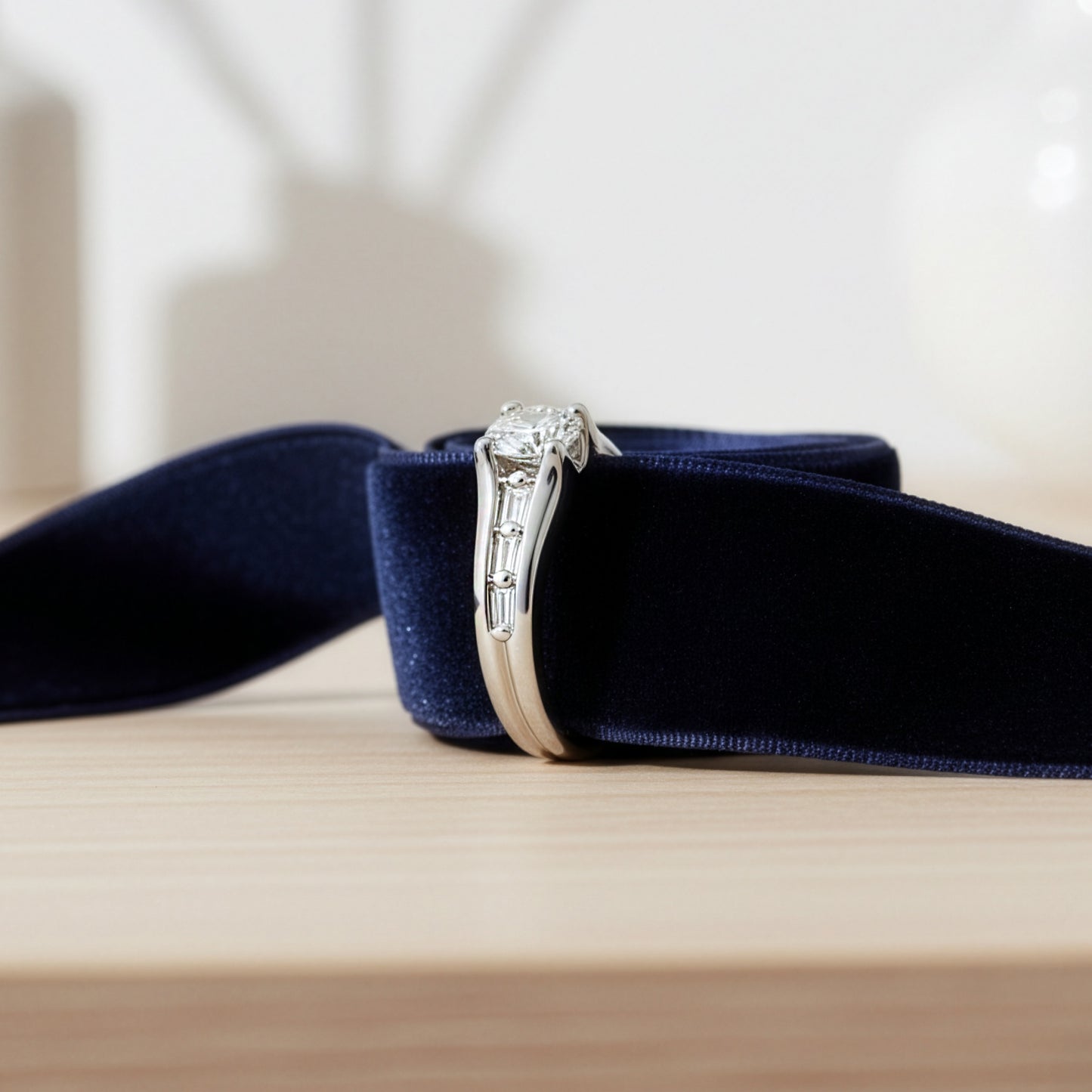 Round Brilliant & Baguette Diamond Ring in White Gold