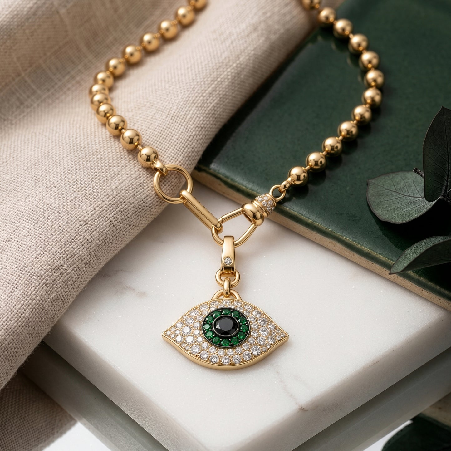 14k Yellow Gold Tsavorite and Diamond and Black Diamond Evil Eye Pendent