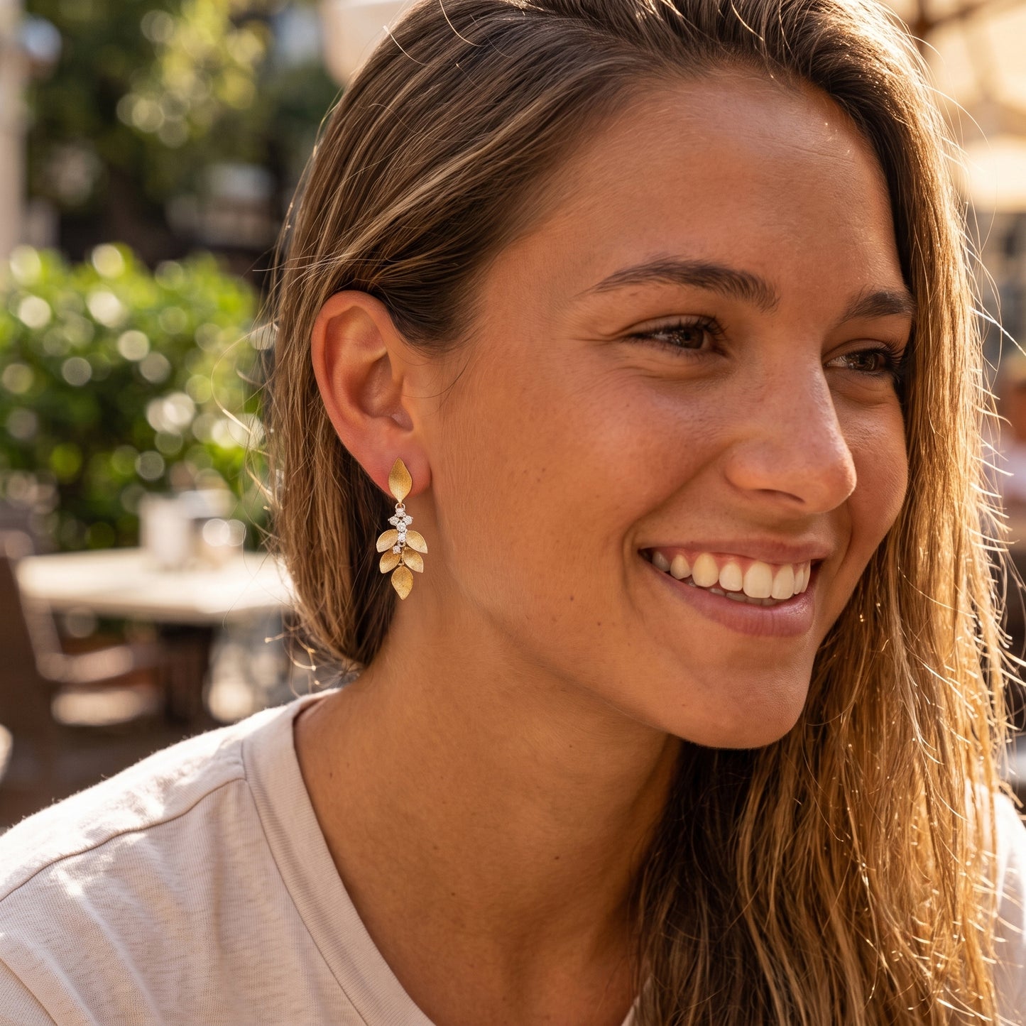 Lucent's Glowing Leaf Earrings in Yellow Gold with Diamond Accents