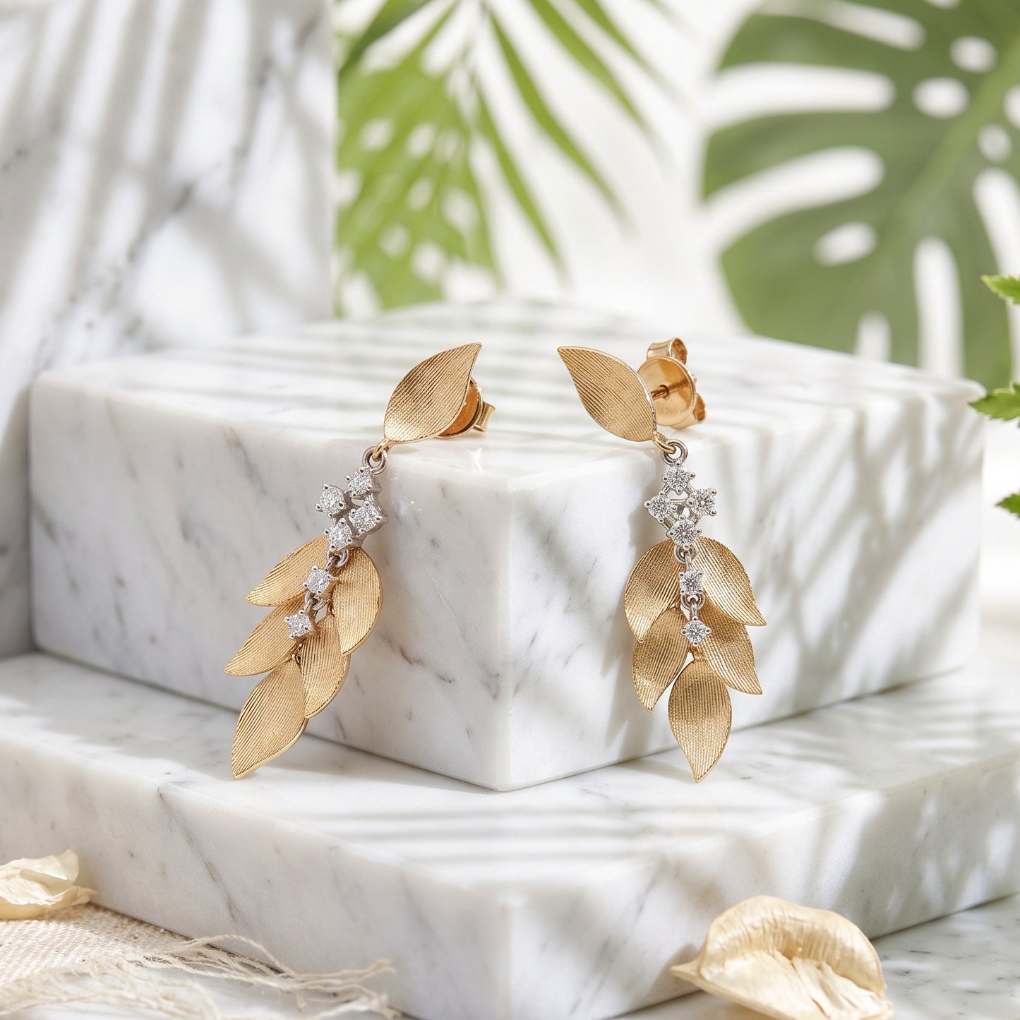 Lucent's Glowing Leaf Earrings in Yellow Gold with Diamond Accents