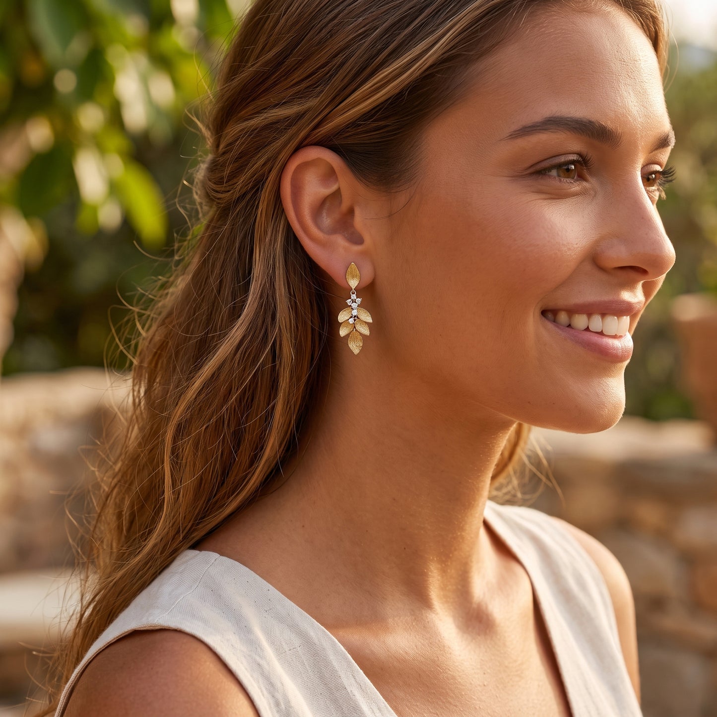 Lucent's Glowing Leaf Earrings in Yellow Gold with Diamond Accents